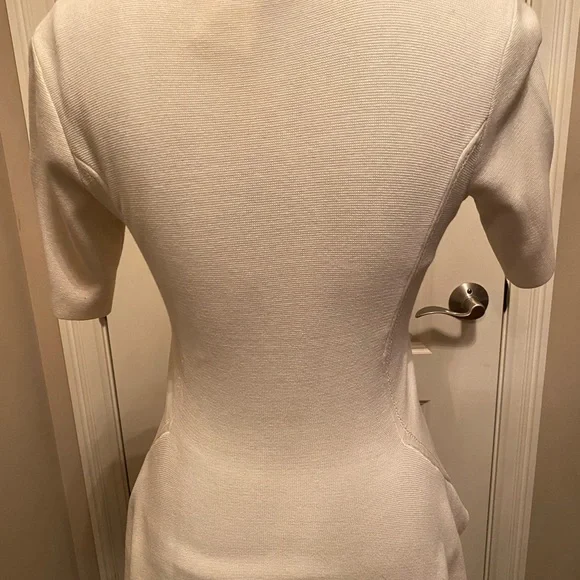 BCBGMAXAZRIA BCBG Cream peplum sweater top. SzM - Picture 6 of 8